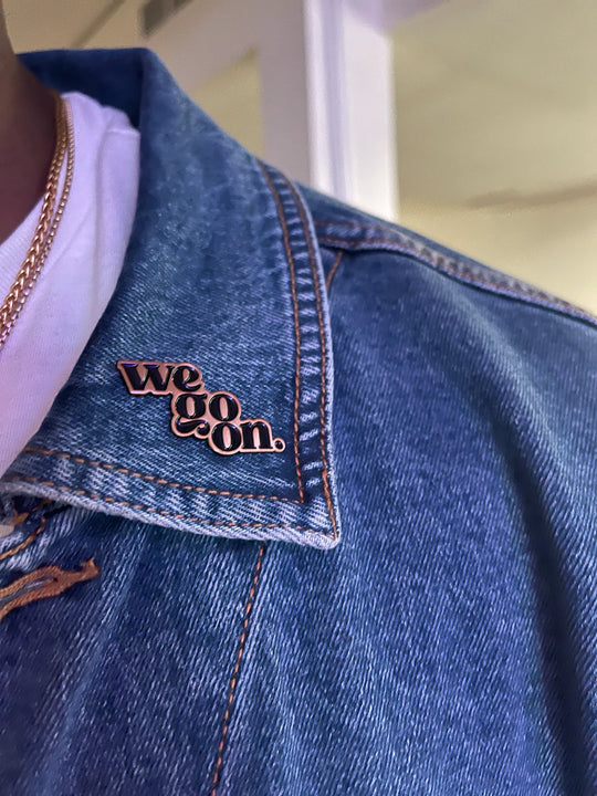 We Go On Lapel Pin