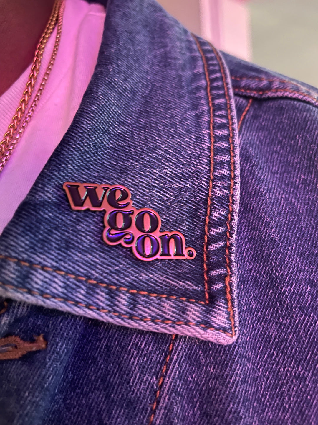We Go On Lapel Pin